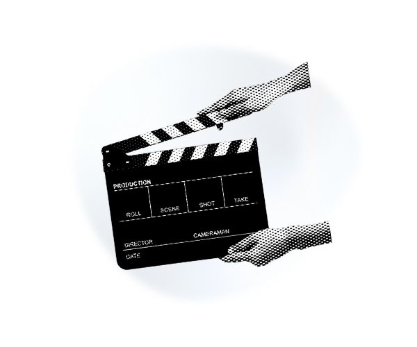 Schwarz-weiße Filmklappe in zwei Händen